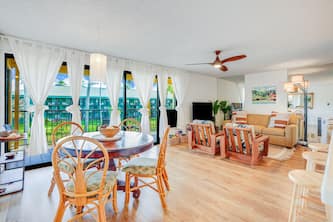 Water-view 3rd-floor condo with lanai, pool & hot tub - near sights & dining