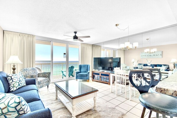 Living room and balcony with beachfront view from the 8th floor.