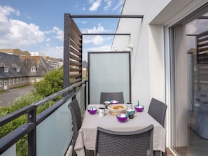 Cloud, Table, Building, Property, Furniture, Window, Sky, Plant, Chair, Tableware