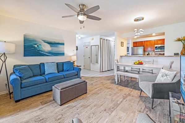 Relax in this tropical inspired living room with ocean breezes and island charm.