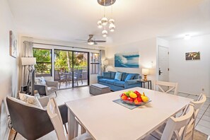 Tropical charm meets modern elegance in this inviting dining space.