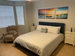 Spacious King Size bed.  Memory foam gel mattress for comfort and ceiling fan.