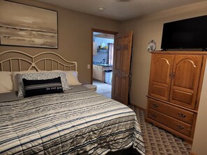 Master Bedroom off Kitchen w/ Flatscreen tv & Roku. Large Sq Ft Window A/C Unit.