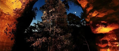 cave at night by candle light