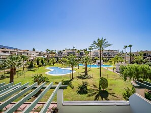 Plant, Sky, Water, Swimming Pool, Tree, Building, Condominium, Land Lot, Urban Design, Arecales