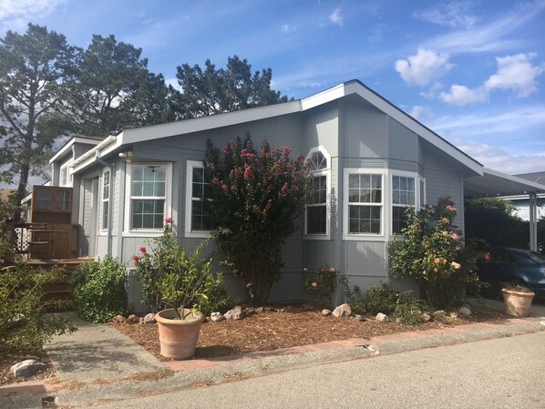 The front of the house, carport is on the far right