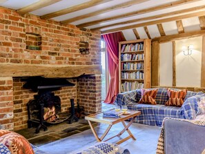 Charcterful living room with an open fire | Masketts Barn, Nutley