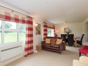 Living room with additional dining area | Jubilee Lodge, Watton