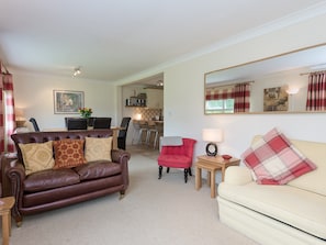 Living room with additional dining area | Jubilee Lodge, Watton