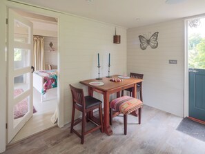 Intimate dining area | Tor Hatch Cabin, Shere, near Guildford