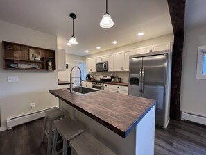 Well-stocked galley kitchen w/all newer appliances
