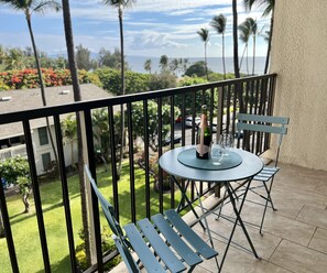 Relax and unwind overlooking the ocean from the lanai