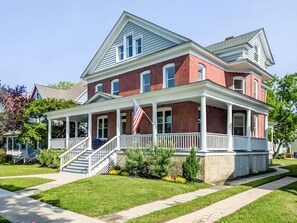 Guests can enjoy the large wrap around porch and its lounge furniture.