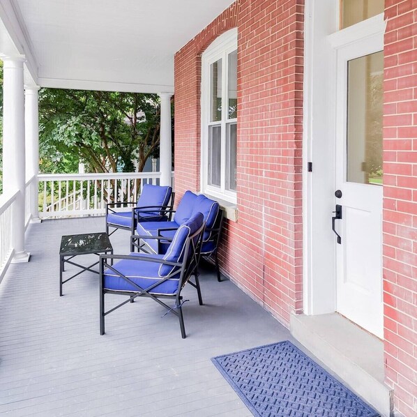 Large Wrap around porch with privacy around the corner if a guest is to stay in the other unit.