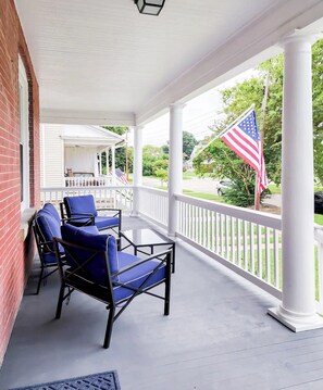 Large Wrap around porch with privacy around the corner if a guest is to stay in the other unit.
