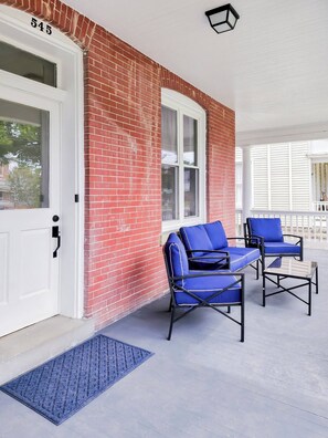 Large Wrap around porch with privacy around the corner if a guest is to stay in the other unit.