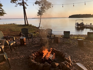 Relax by a fire next to the lake