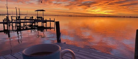 Enjoy a cup of coffee and watch the sunrise from the dock