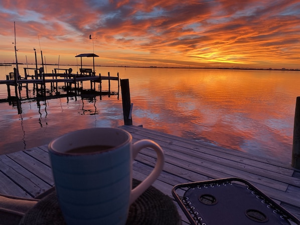 Enjoy a cup of coffee and watch the sunrise from the dock