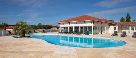 Lounge by the pool in the sunshine and take a dip in the outdoor pool.