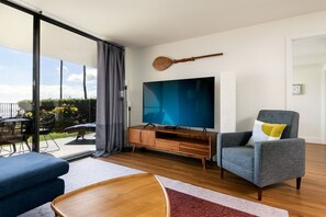 Catch sunsets and your favorite shows—this stylish oceanfront living room is made for laid-back vibes and luxe Maui moments with a view.