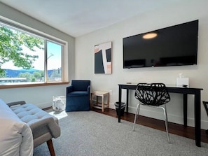 Hardwood floors and cozy wool rug