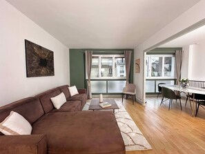A roomy living room regarding the dining area.
