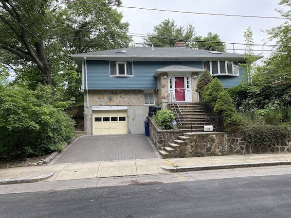 Front view of the  single house builded on the hill in a nice street of Boston 