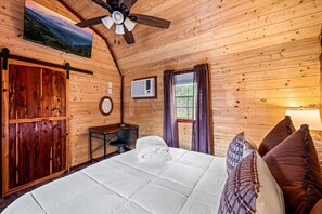 Master bedroom ceiling fan, desk and 48" smart TV