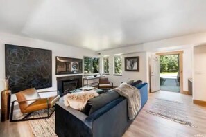 Lower Level Living Room with 55" HD TV and Gas Fireplace