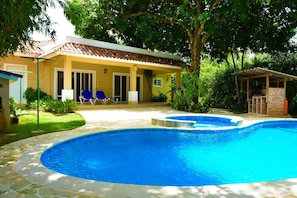 Another View of the pool jacuzzi (not heated)  charcoal bbq and patio.