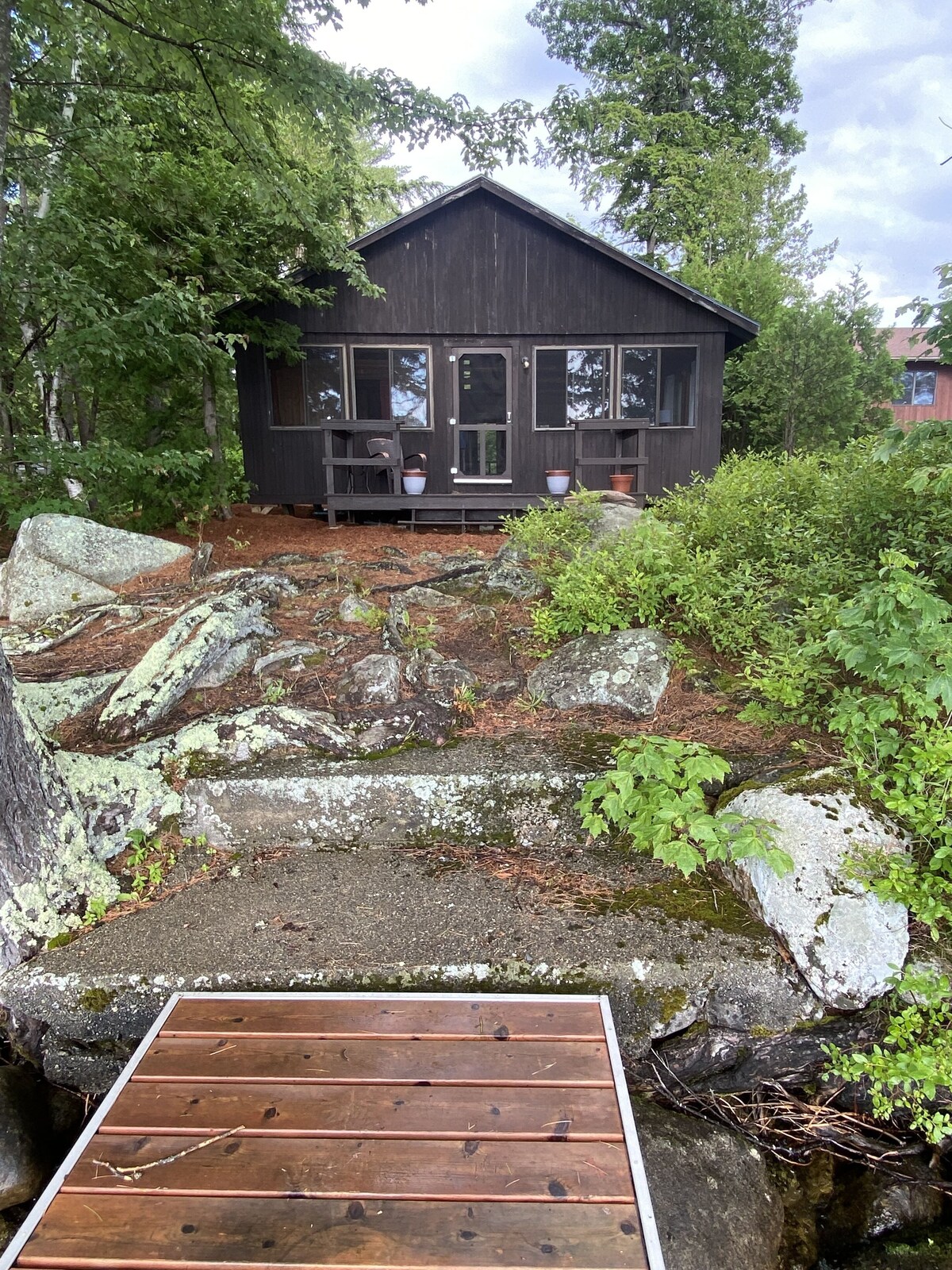 Dog-friendly rustic waterfront camp on Great Pond!