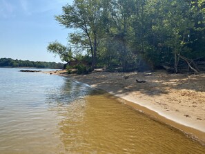 Sandy Beach is a short boat or kayak ride away