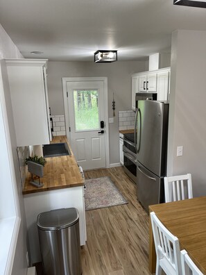 Kitchen has refrigerator, double oven, microwave, dishwasher, all the amenities.