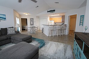 Living room looking into kitchen.