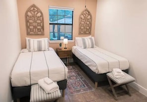 This is our "Marfa" room :) With west-TX color and style and 2 single beds