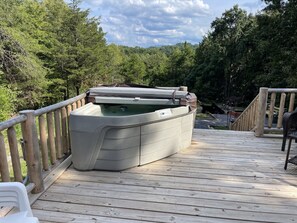 Enjoy time in the hot tub set where nobody can see. 