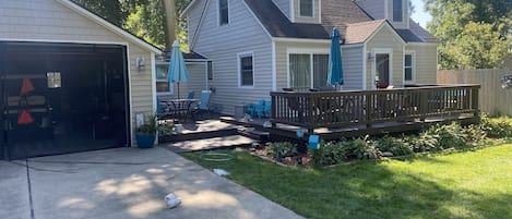 Front of the cottage, big driveway with a patio that has outdoor seating for 8!