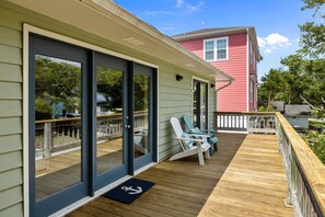 Adirondack chairs on the front porch offer a perfect spot for morning coffee.