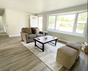 Open living space with new flooring and furniture 