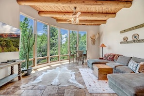 Living Room with Large Sectional and Smart TV