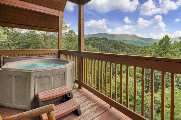 Luxury Lookout's bubbling hot tub with views