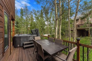 Outdoor dining area with seating for six.