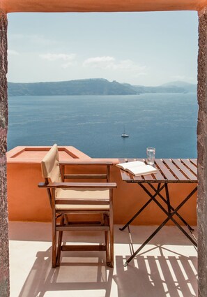 Private balcony overlooking the caldera