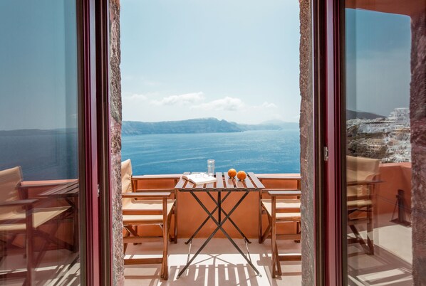 Private balcony overlooking the caldera