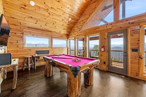 Game room with pool table and arcade!!