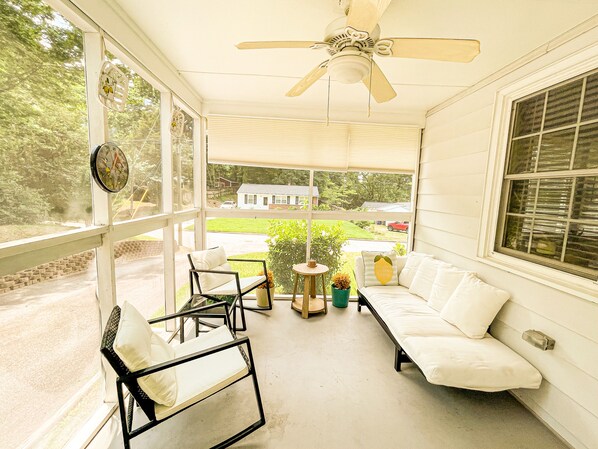 Screened in porch with ceiling fan & light to enjoy in all seasons.