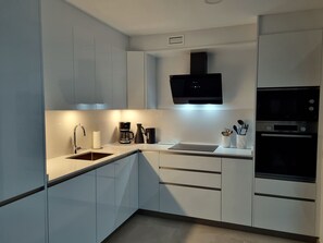 Kitchen with dishwasher and microwave