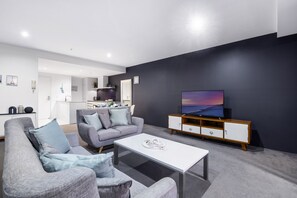 Relax in our living room area just right next to the balcony ✨