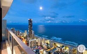 Balcony features glittering ocean and city views